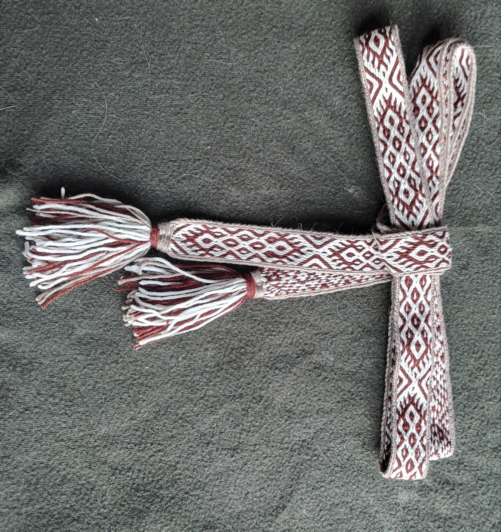 Belt with Finnish Iron Age ''applesies in grand sieve'' pattern