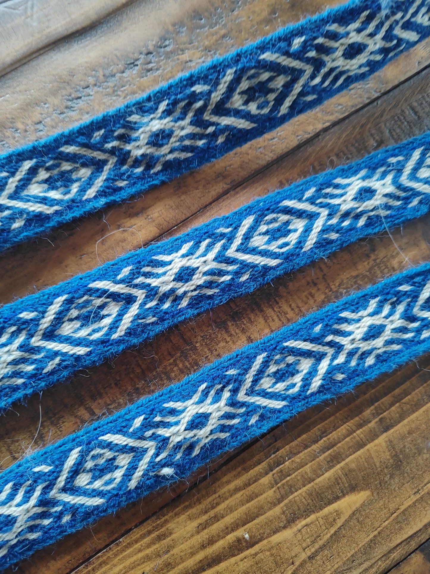 Blue belt with star and diagonal pattern