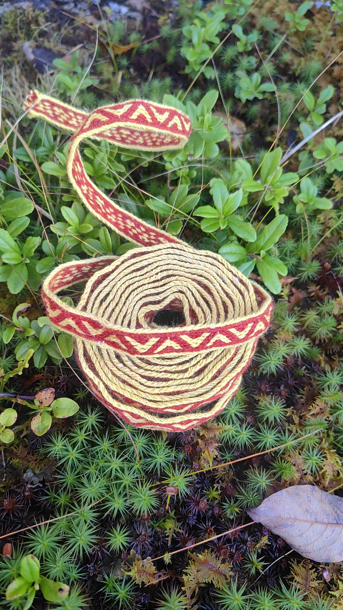 Medieval Latvian ribbon made of plant dyed yarns