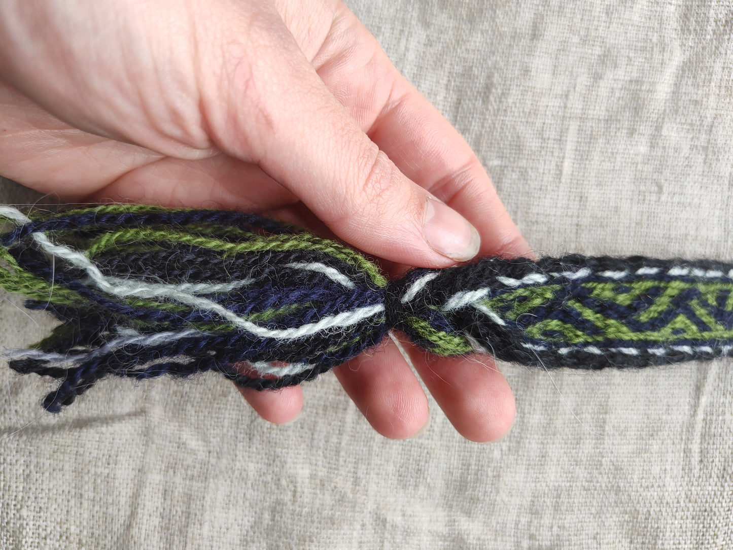 Belt with Finnish Iron Age pattern "tree climbers"