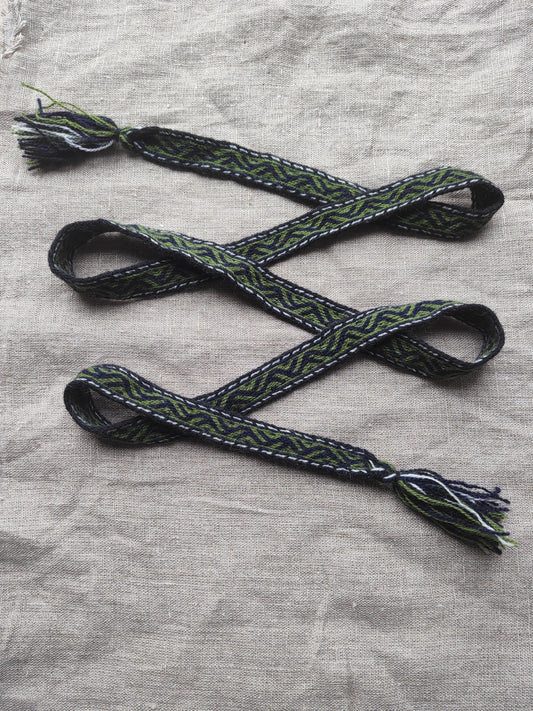 Belt with Finnish Iron Age pattern "tree climbers"