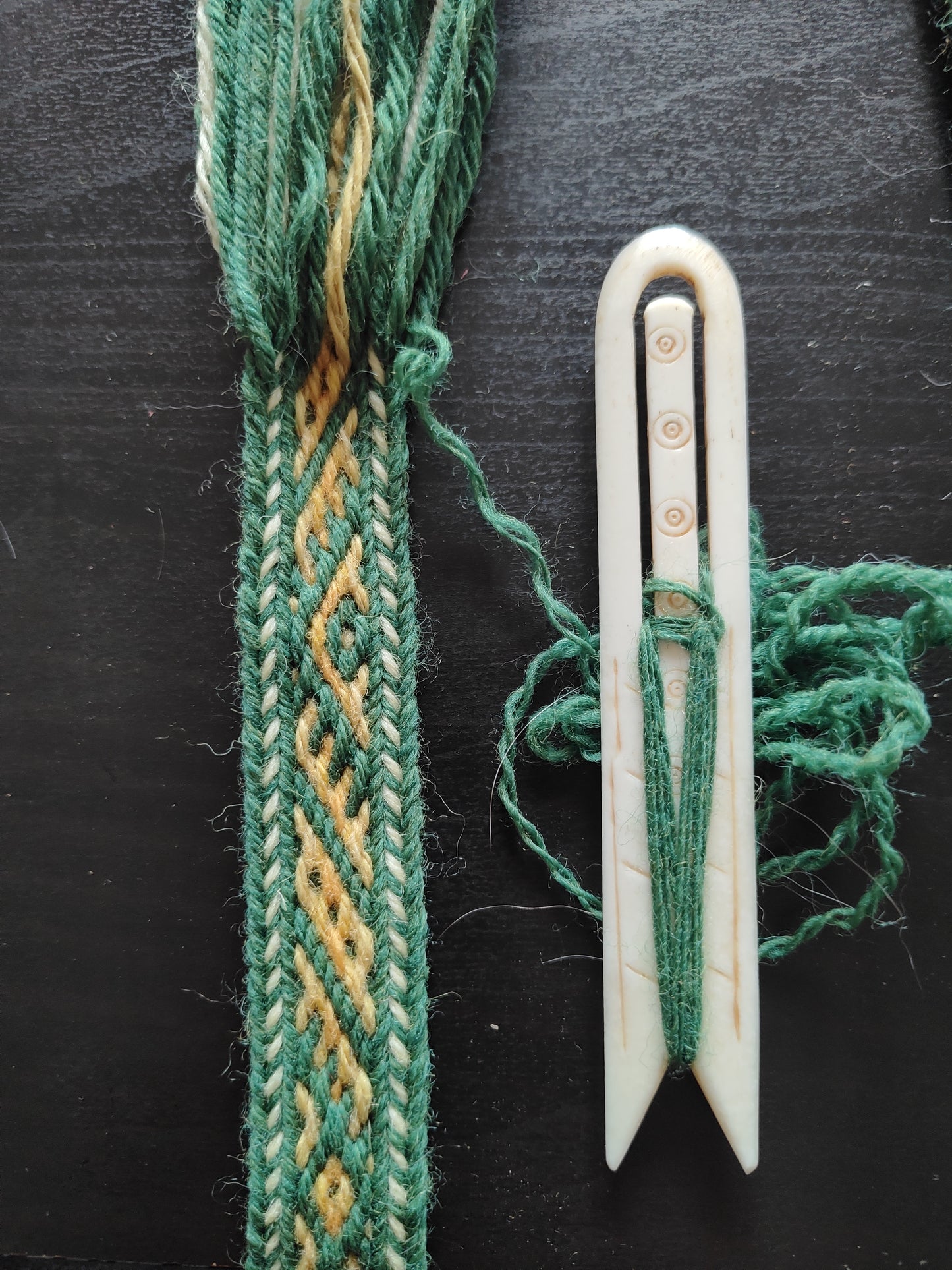 Belt with historical Latvian pattern in green