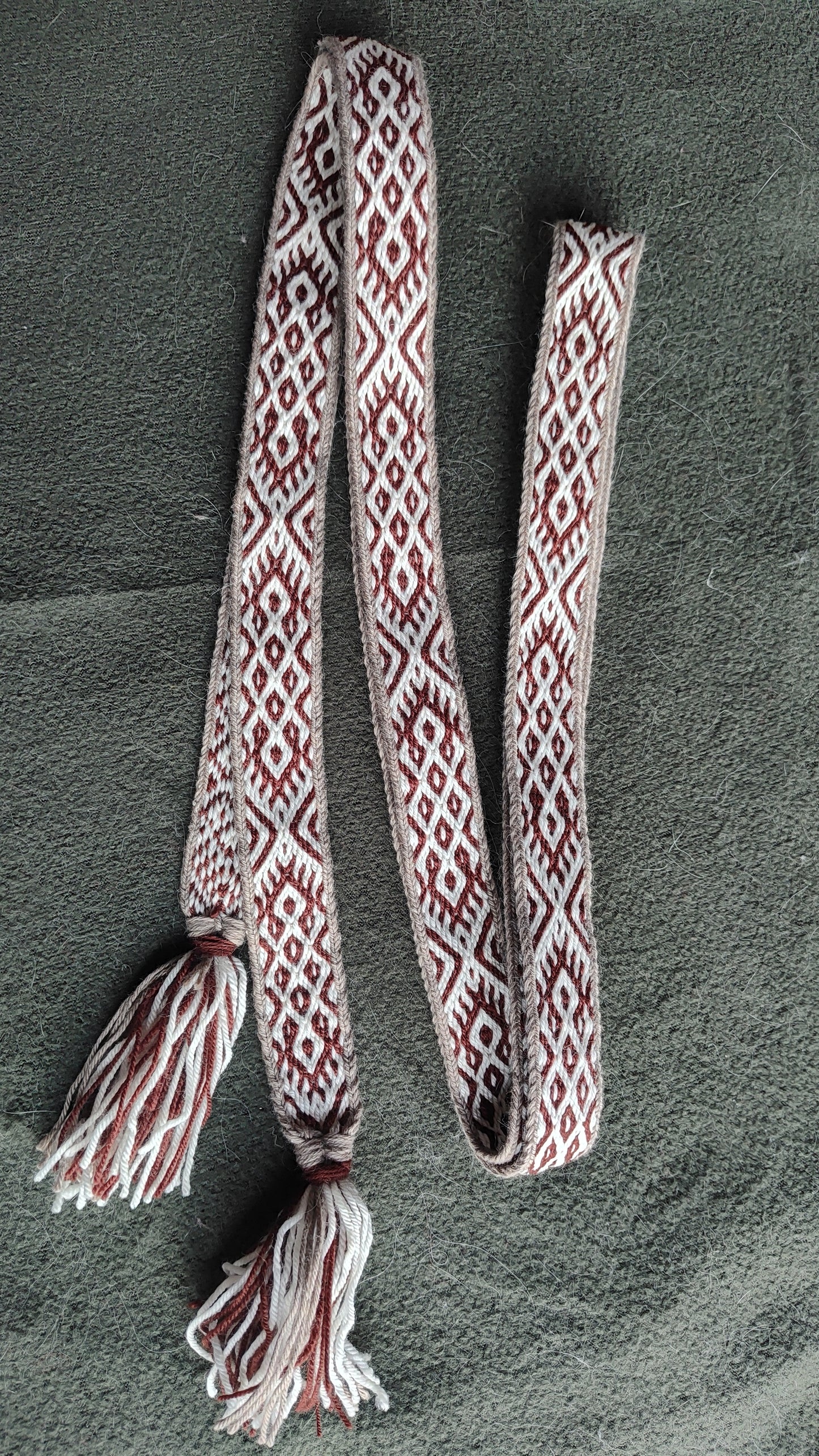 Belt with Finnish Iron Age ''applesies in grand sieve'' pattern