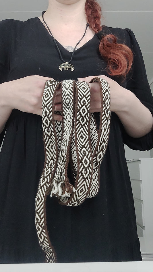 Brown belt with diamond and diagonals pattern
