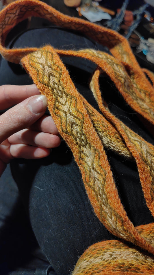 Belt with orange and green pattern (plant dyed yarns)