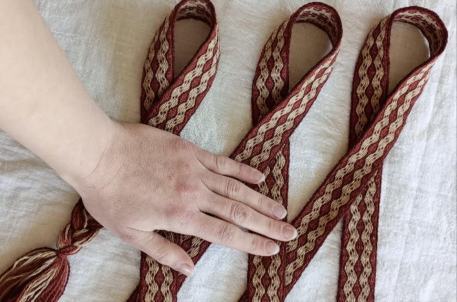 Brown belt with diamond pattern