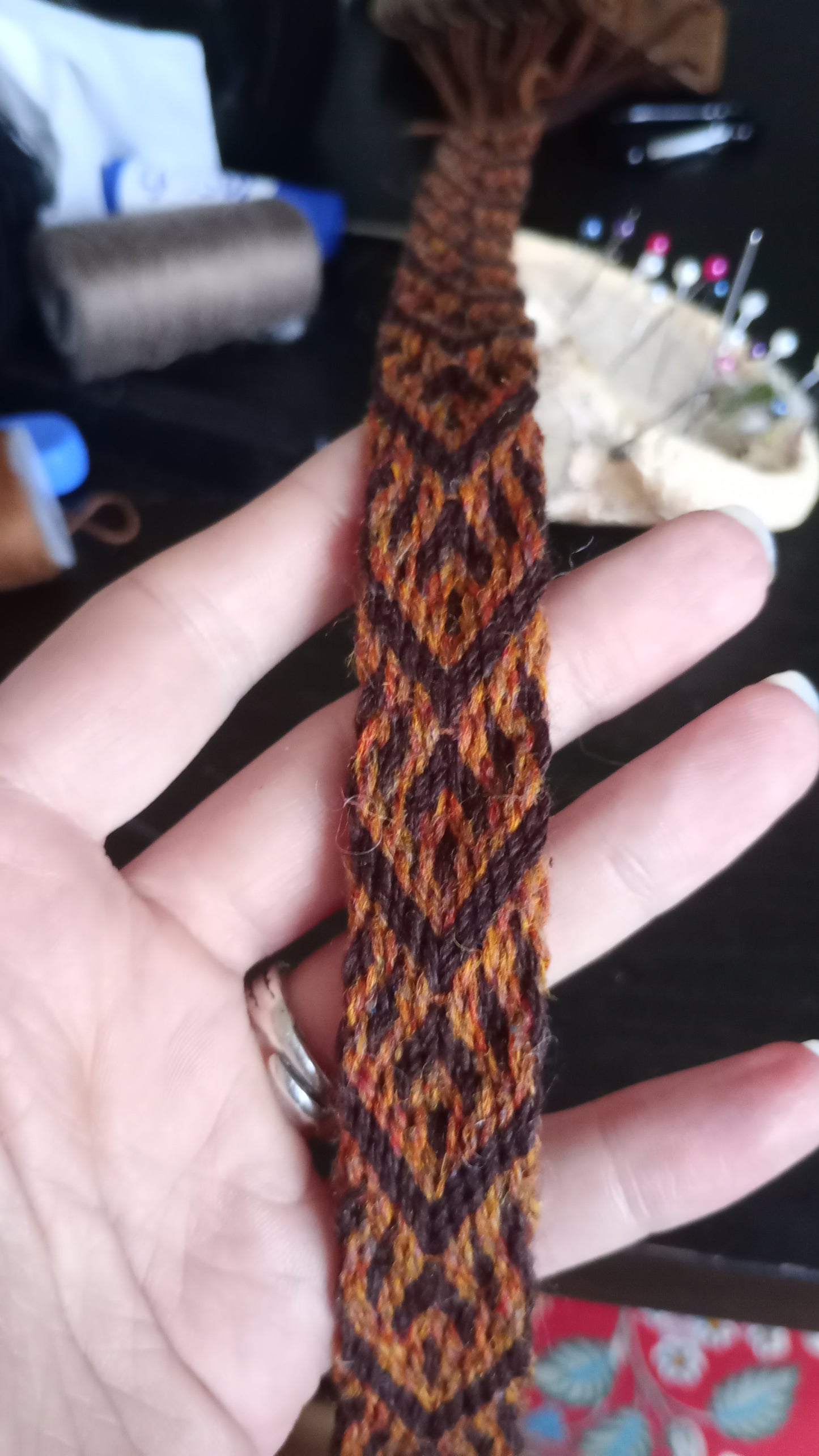 Brown belt with spike and arrow pattern