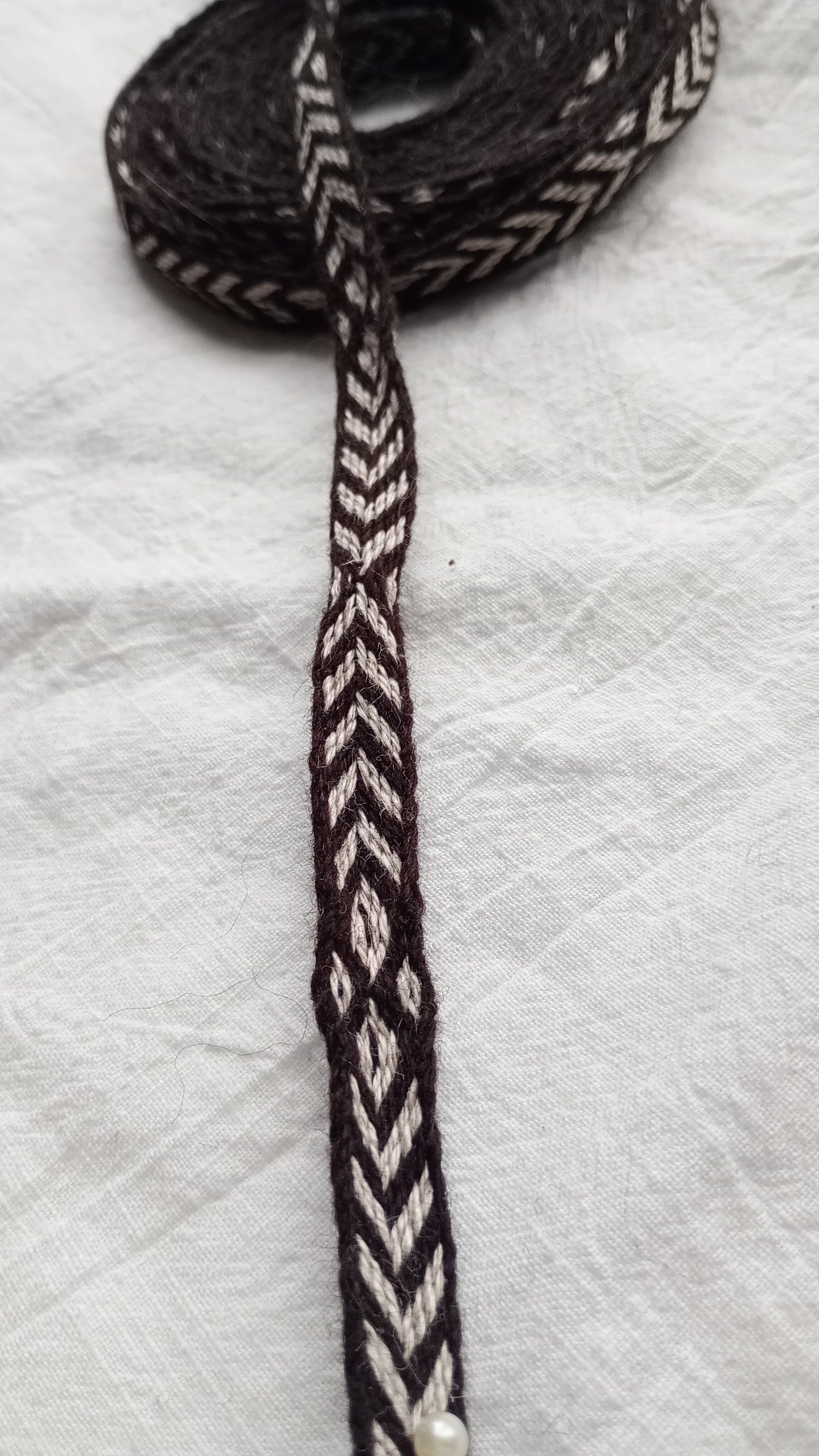 Reconstruction of 9-10th century Viking tablet woven trim from Kaupang