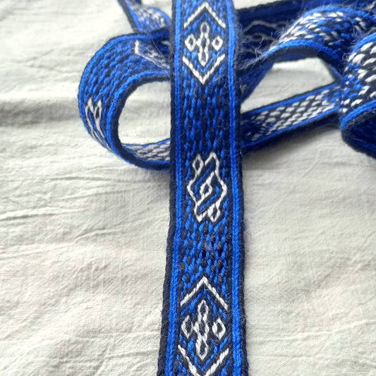 Bright blue belt with white motive