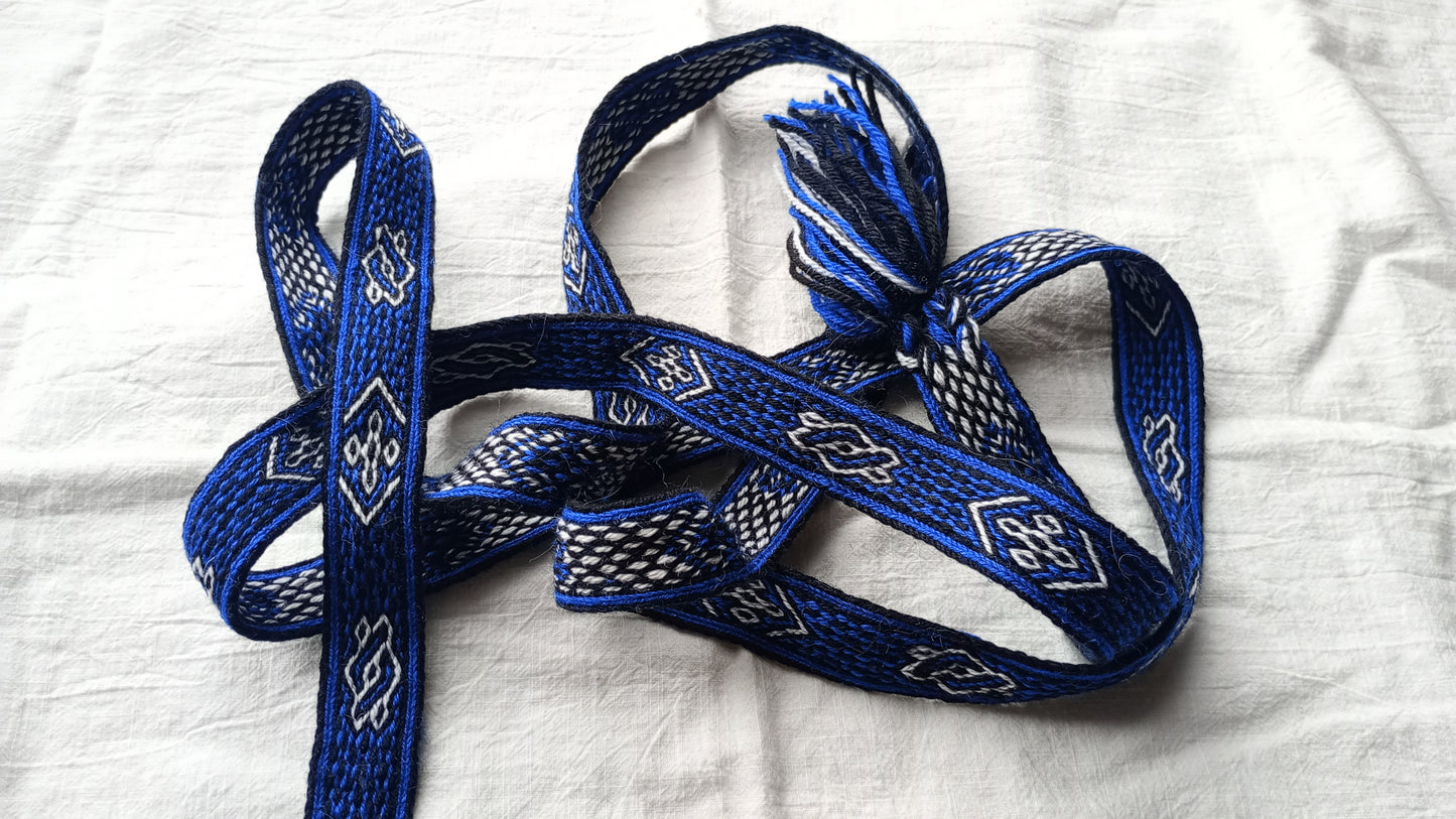 Bright blue belt with white motive