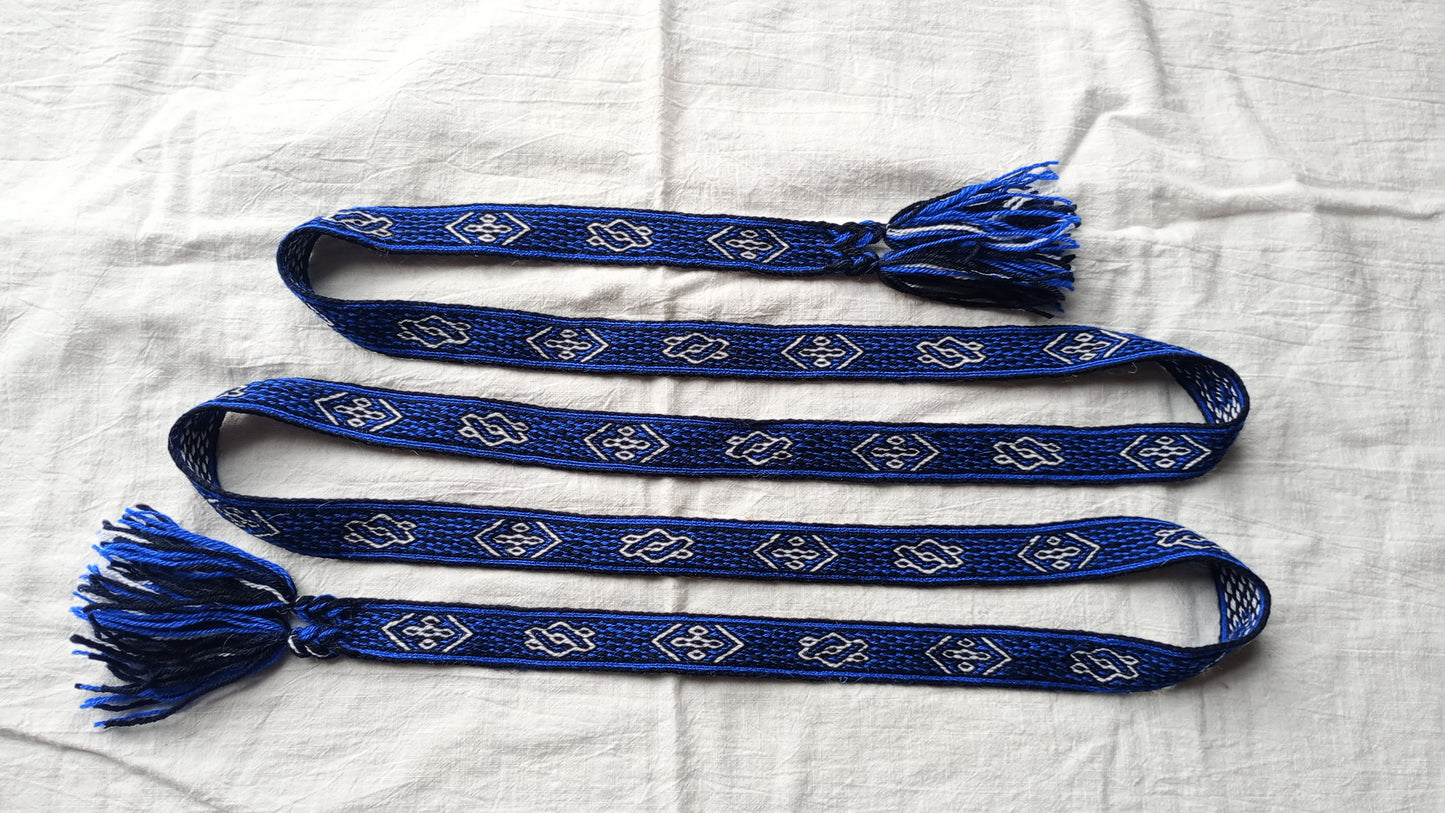 Bright blue belt with white motive