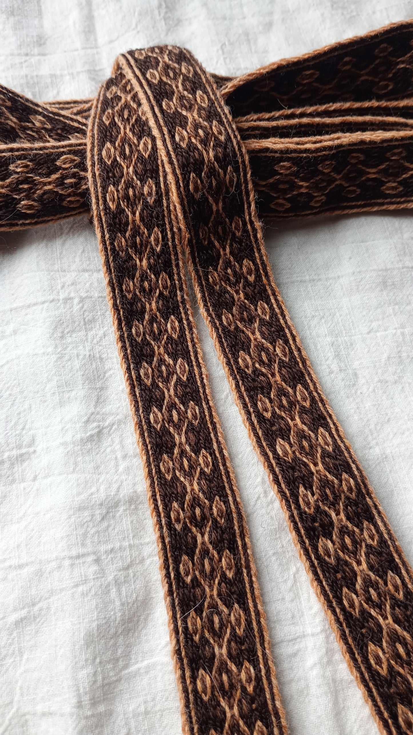 Orange and brown diamond patterned belt