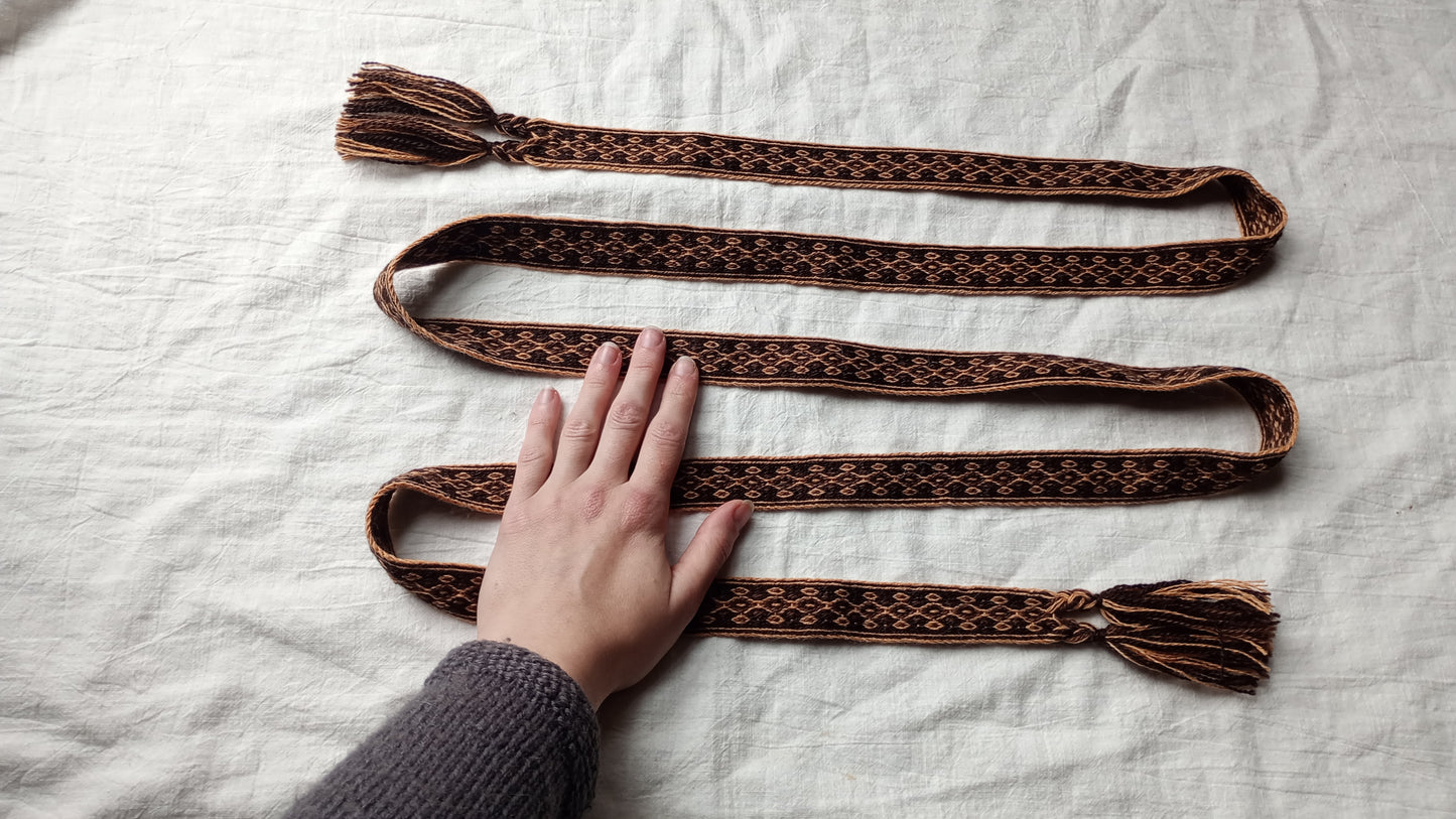 Orange and brown diamond patterned belt