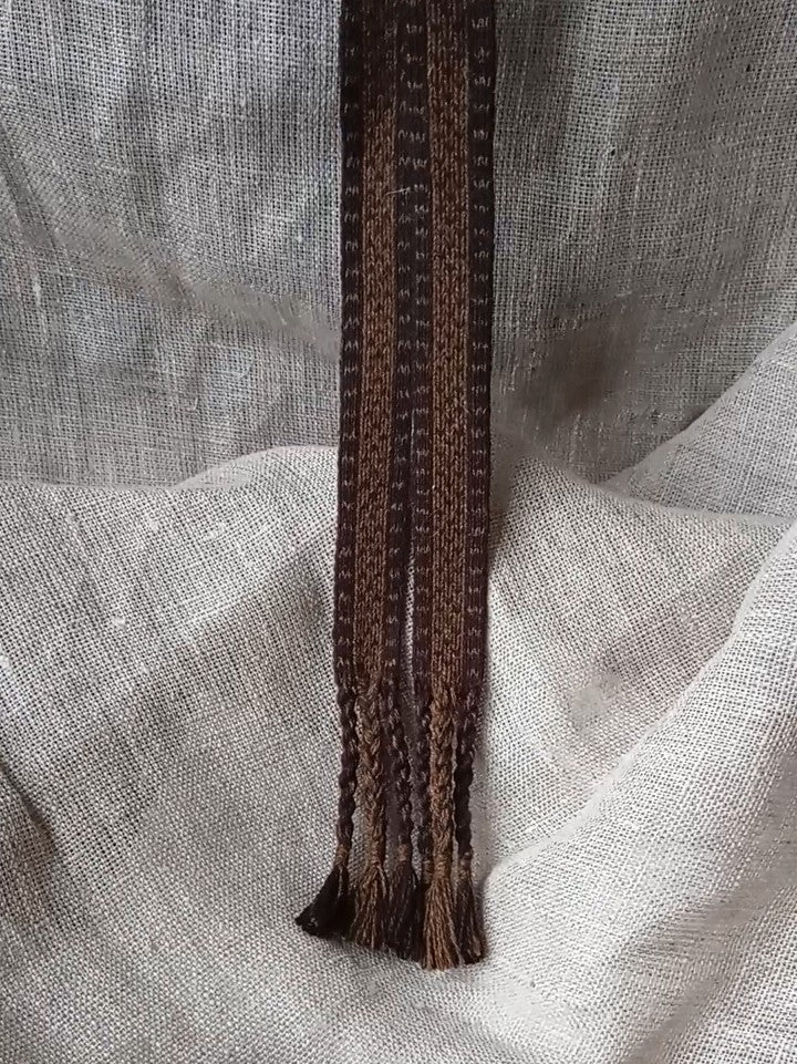 Double sided belt with tassels