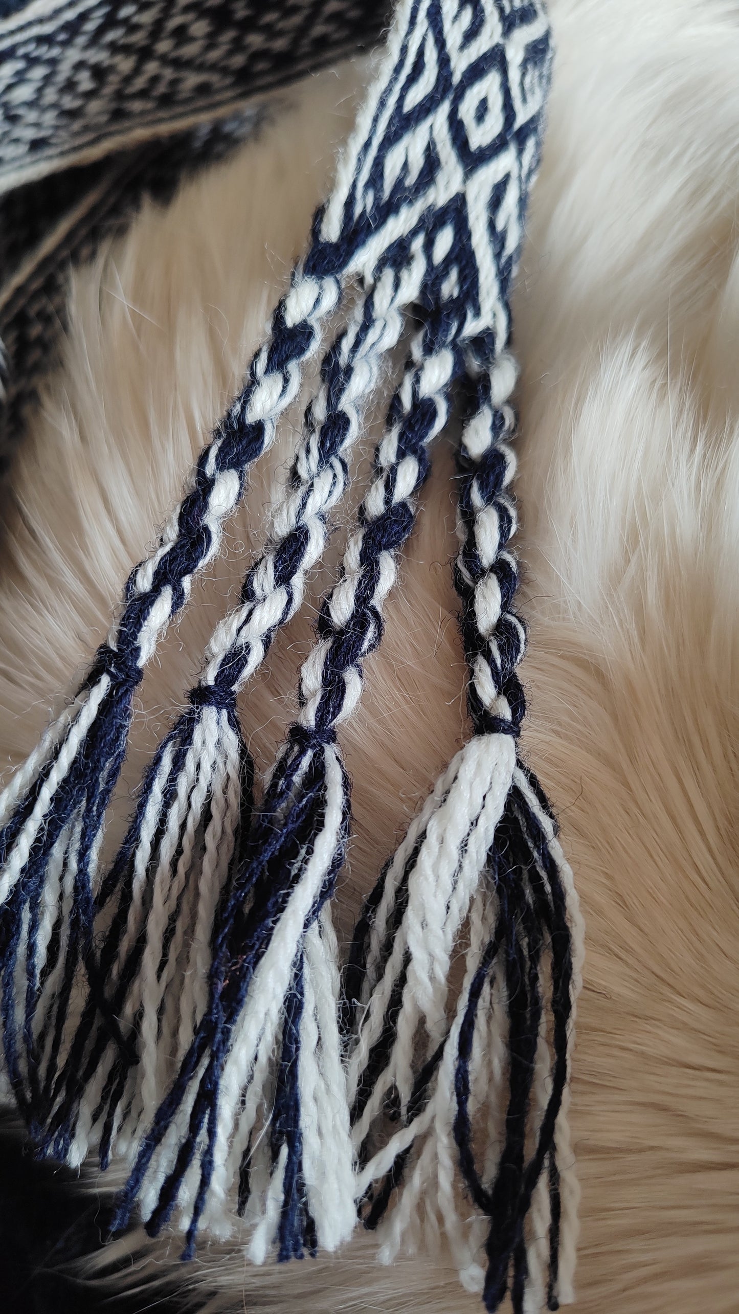 Blue belt with star and key teeth diagonal pattern