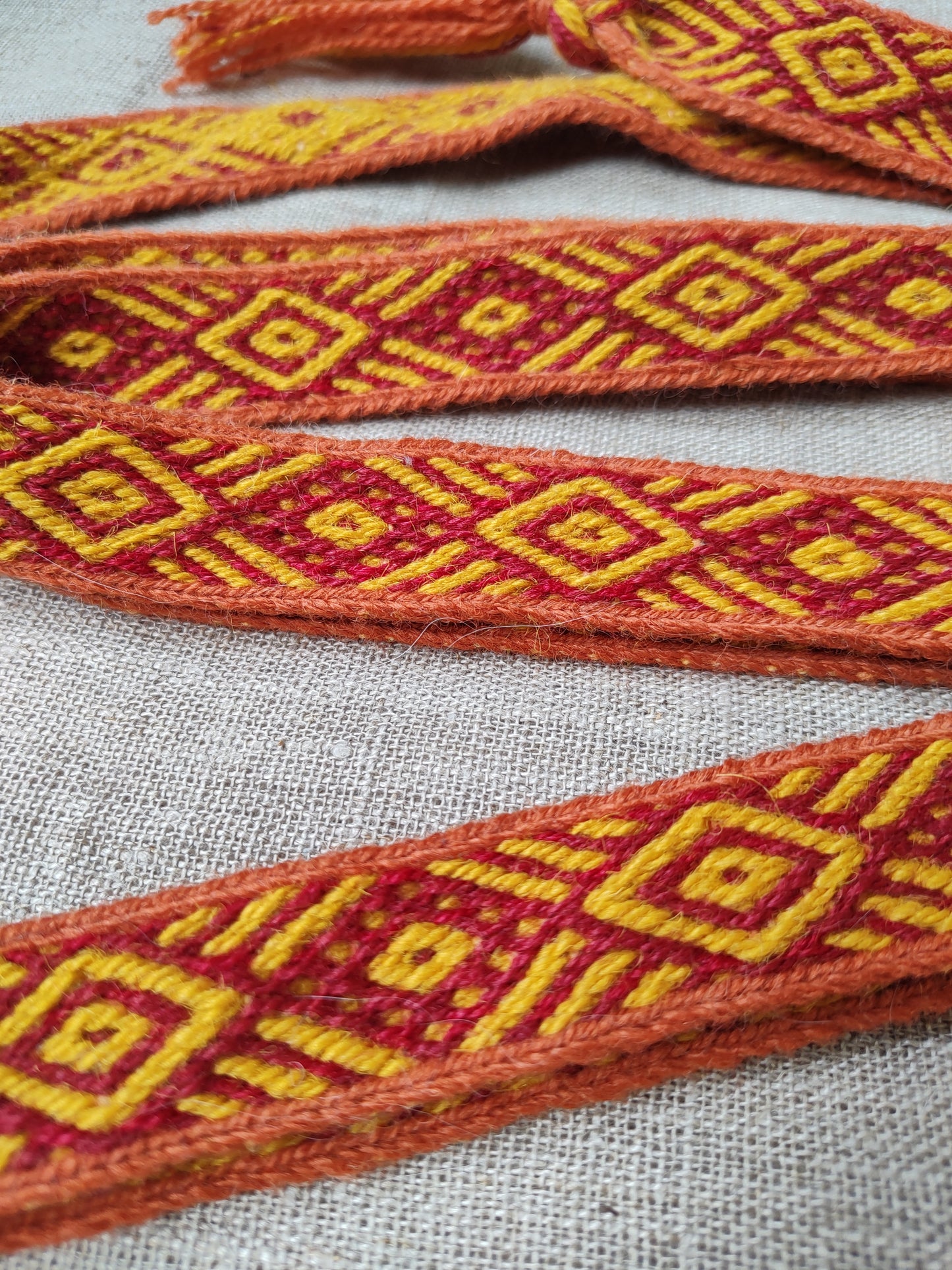 Orange belt with diagonal lines pattern