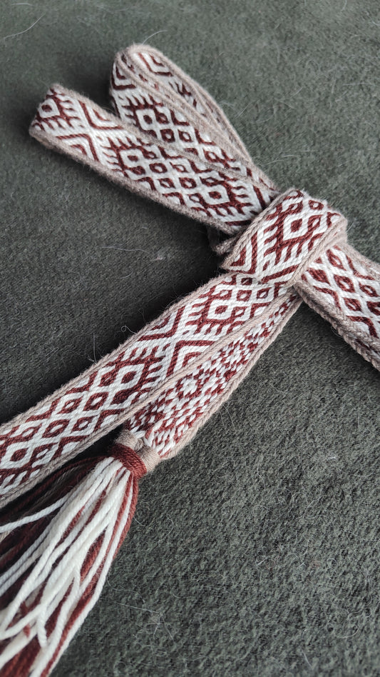 Belt with Finnish Iron Age ''applesies in grand sieve'' pattern