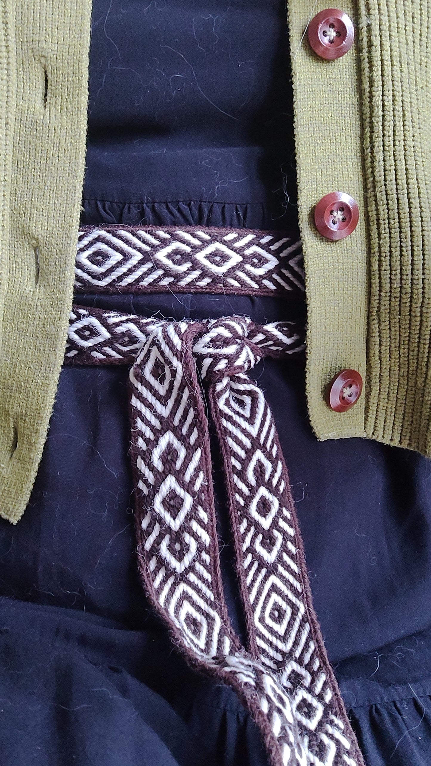 Brown belt with diamond and diagonals pattern