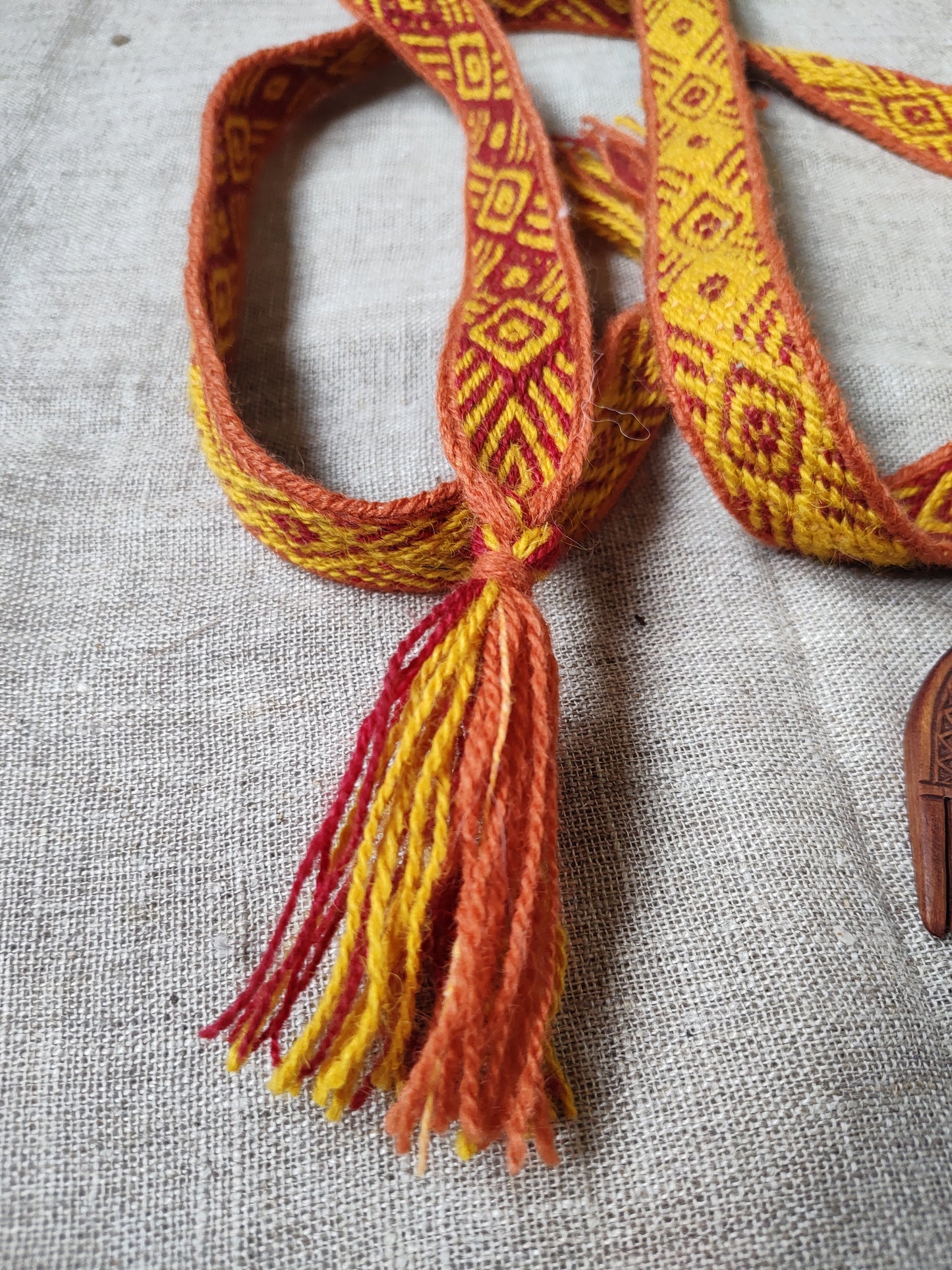Orange belt with diagonal lines pattern