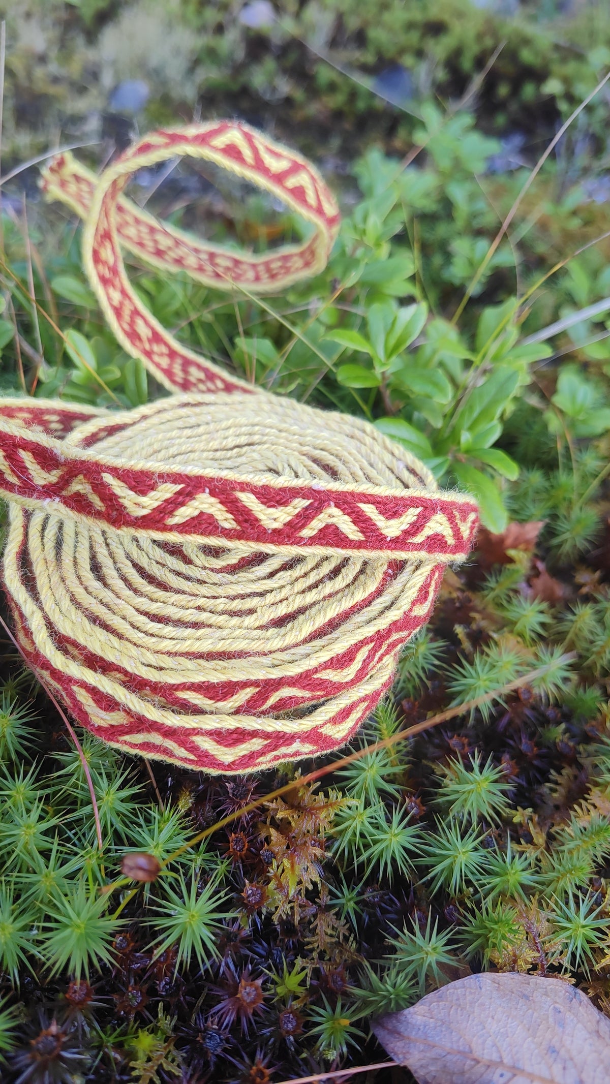 Medieval Latvian ribbon made of plant dyed yarns