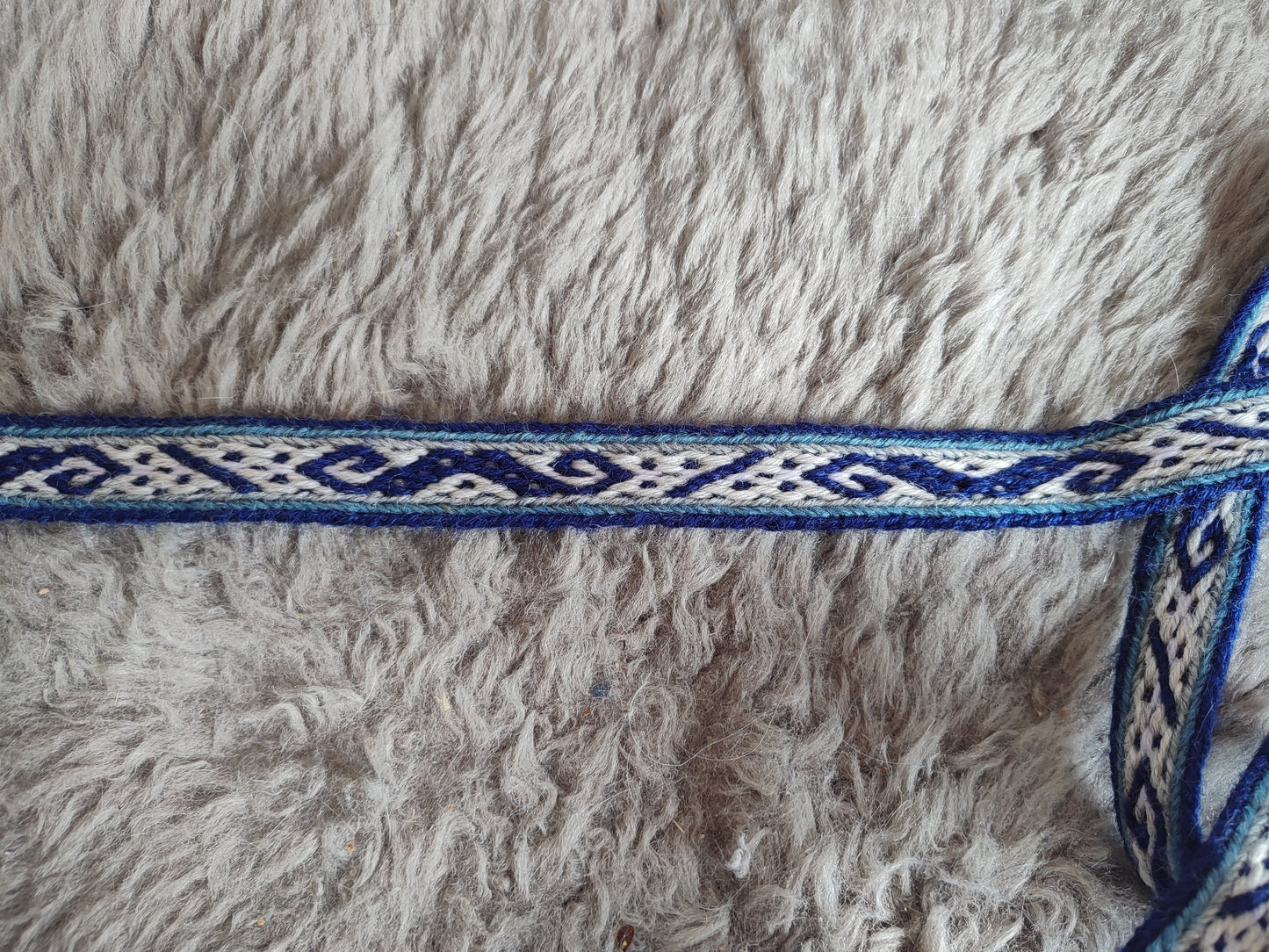 Belt with historical Latvian pattern in blue