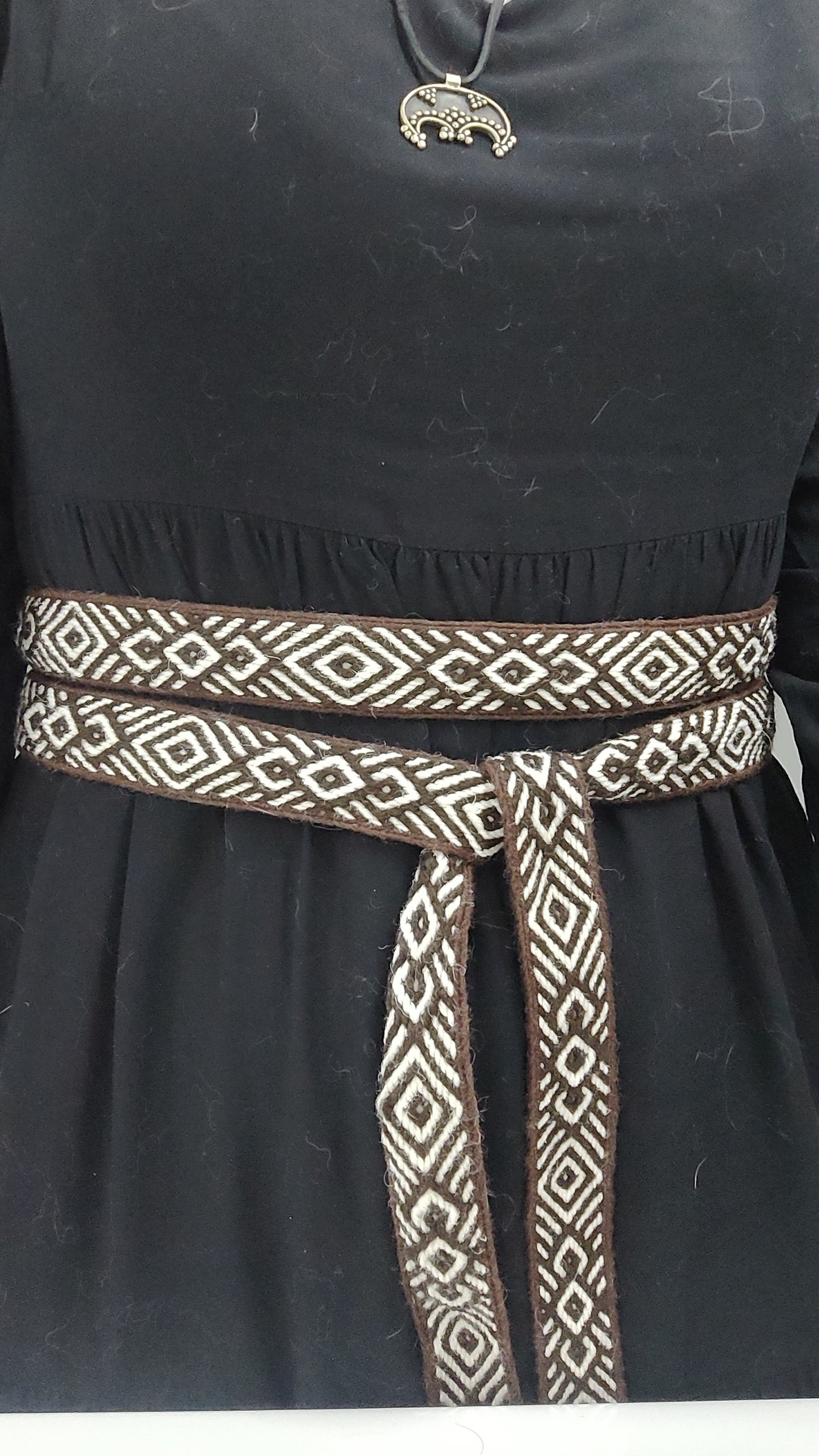 Brown belt with diamond and diagonals pattern