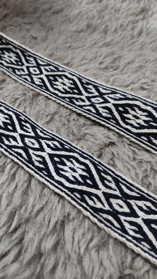 Blue belt with star and key teeth diagonal pattern