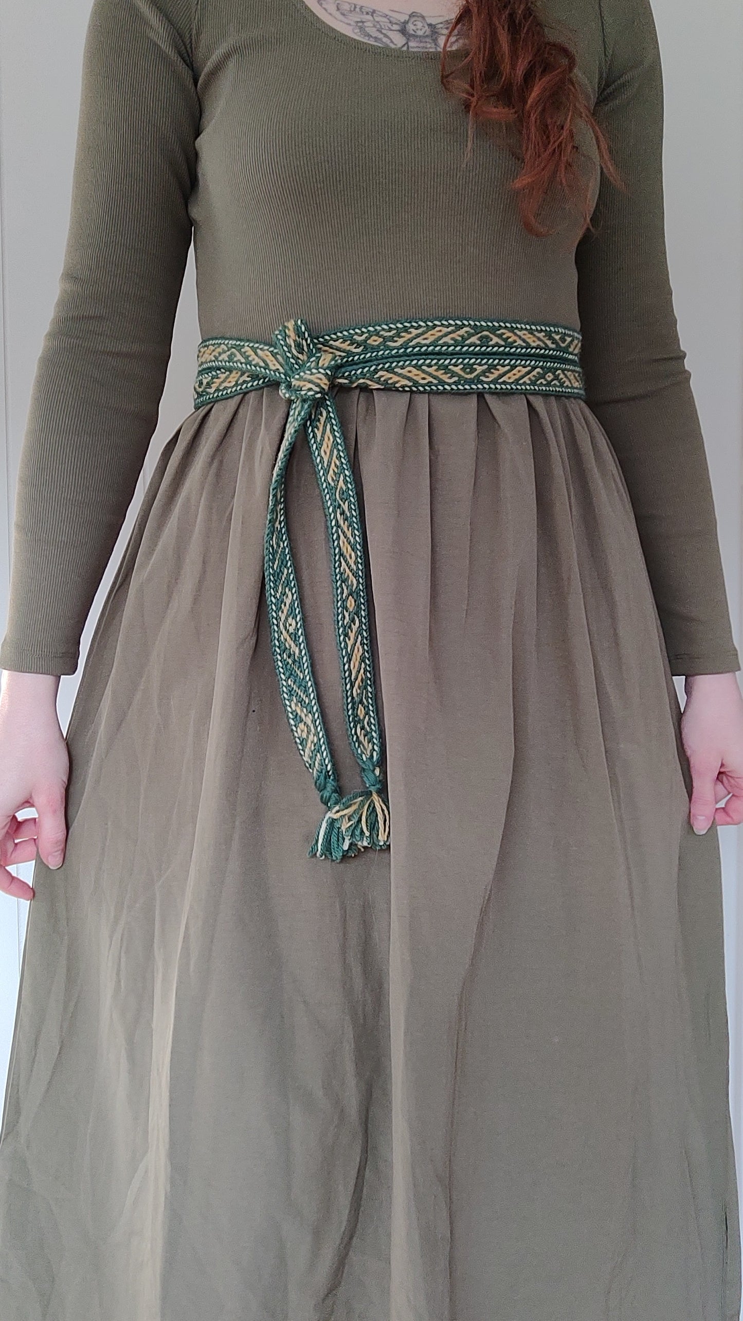 Belt with historical Latvian pattern in green