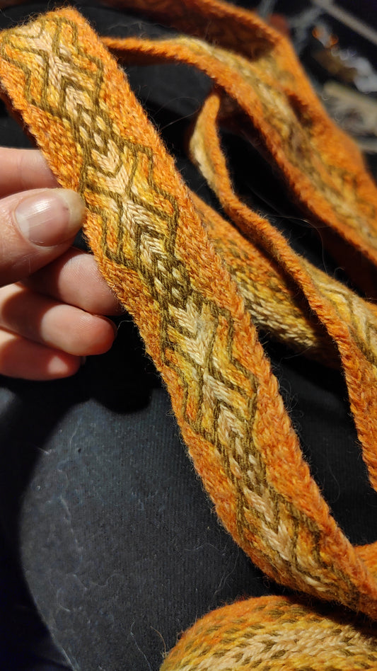 Belt with orange and green pattern (plant dyed yarns)