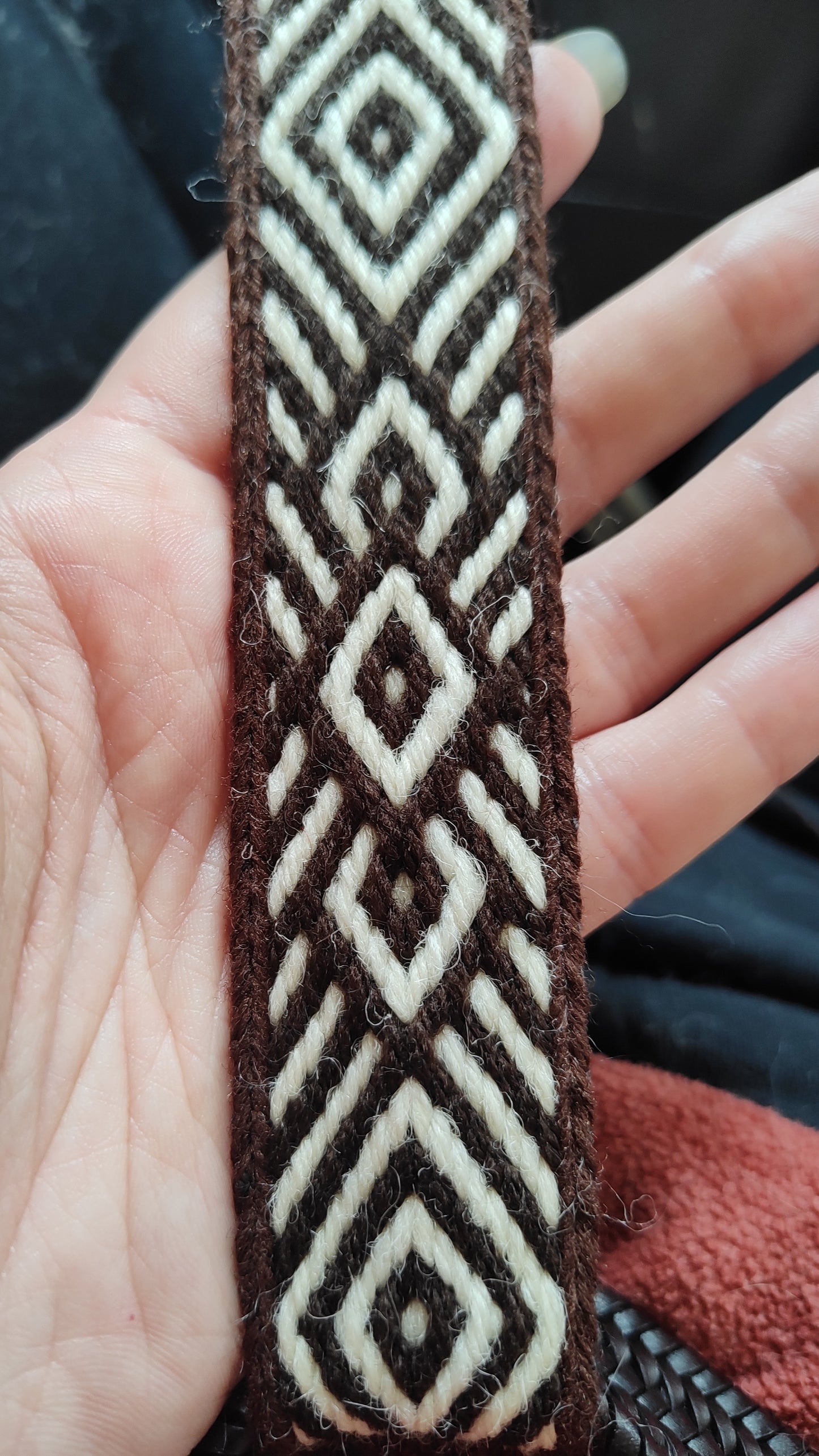 Brown belt with diamond and diagonals pattern