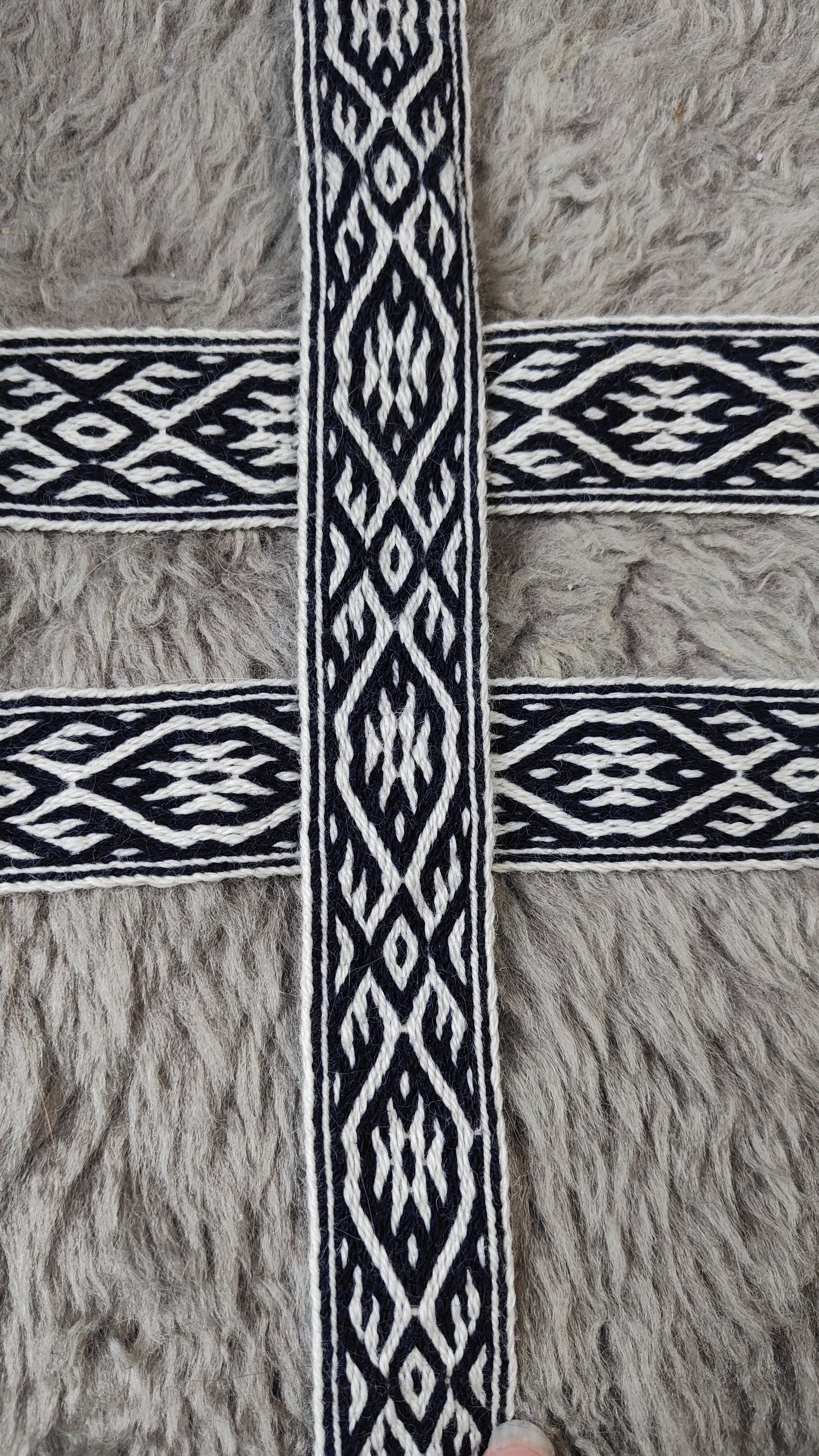 Blue belt with star and key teeth diagonal pattern
