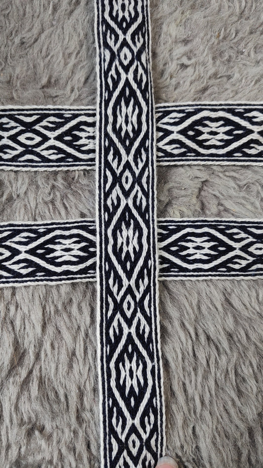 Blue belt with star and key teeth diagonal pattern