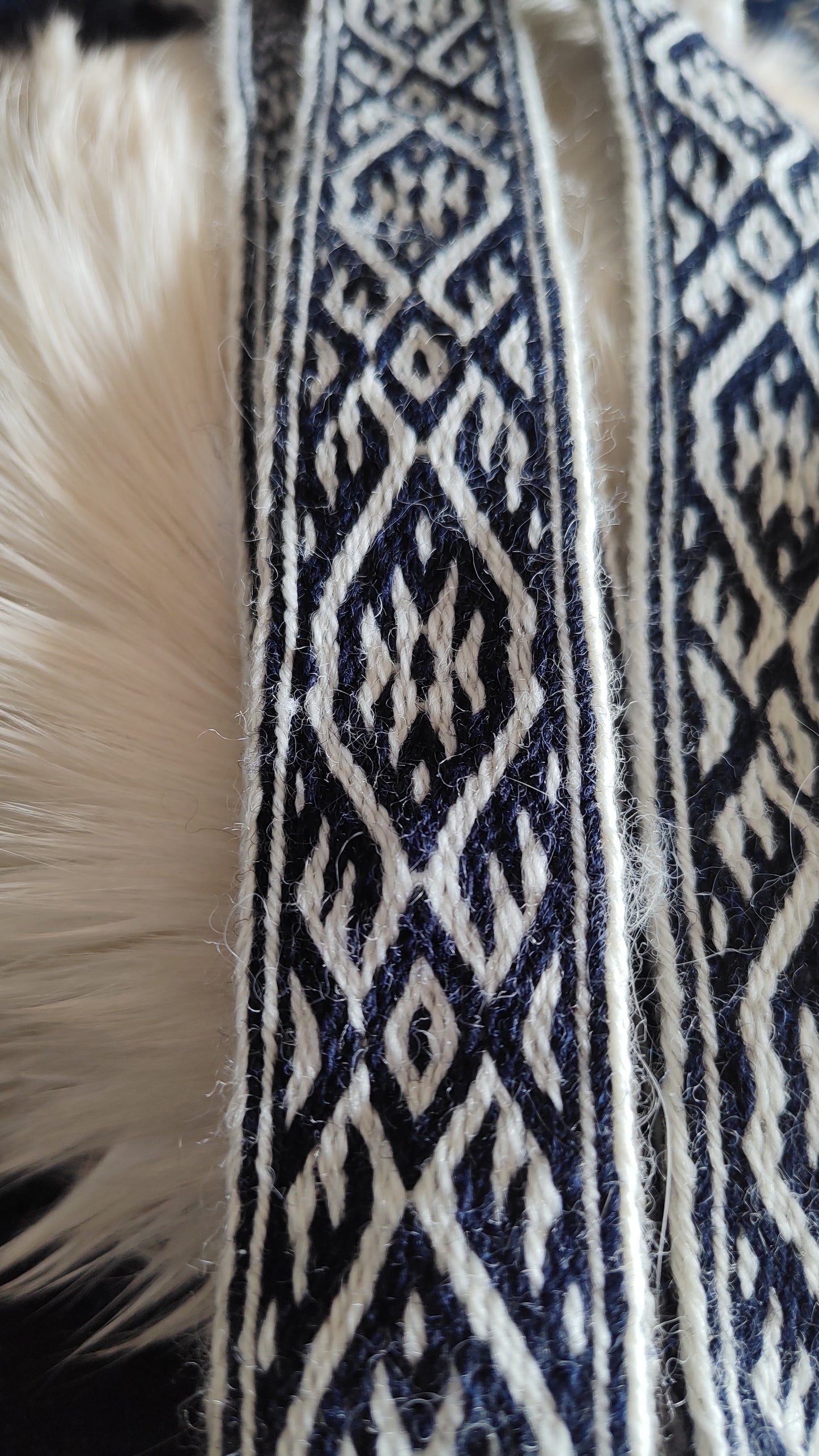 Blue belt with star and key teeth diagonal pattern