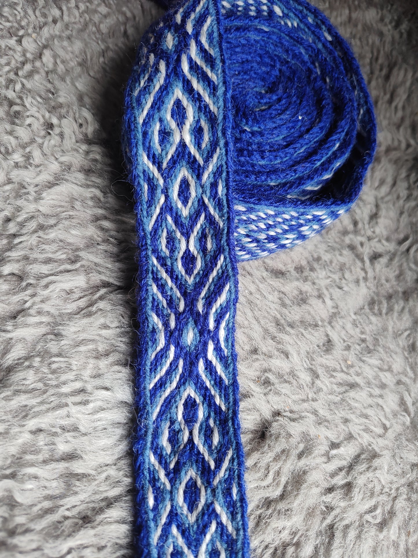 Robust folk style belt with diagonals