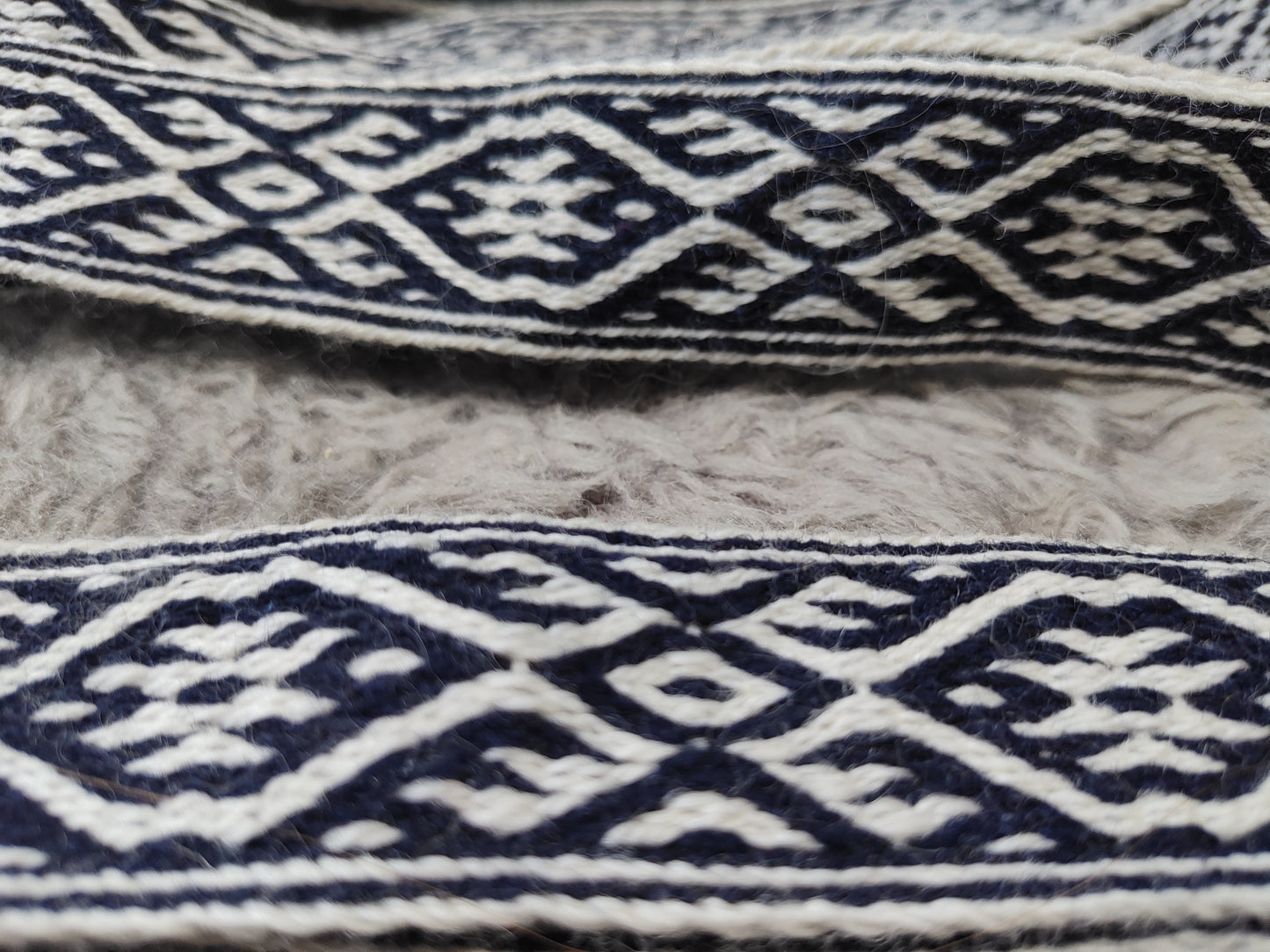 Blue belt with star and key teeth diagonal pattern