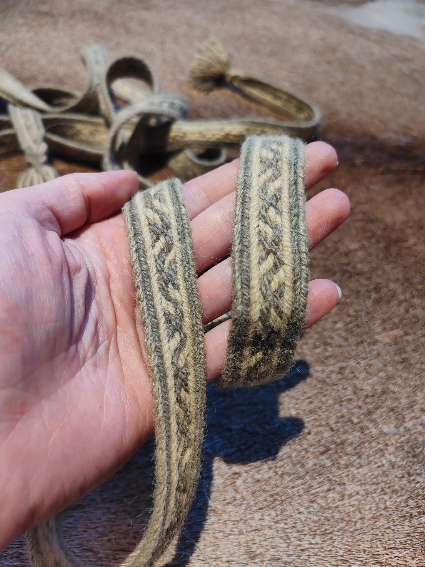 Extra long plant dyed belt with Latvian ∾ pattern