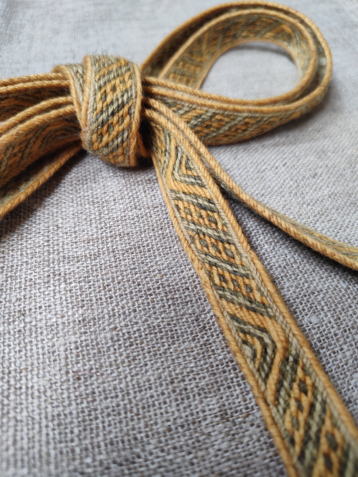 Latvian medieval band with triangle pattern (plant dyed yarns)