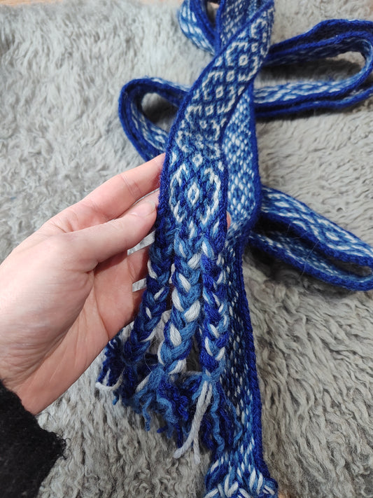 Bright blue belt with "flowers"