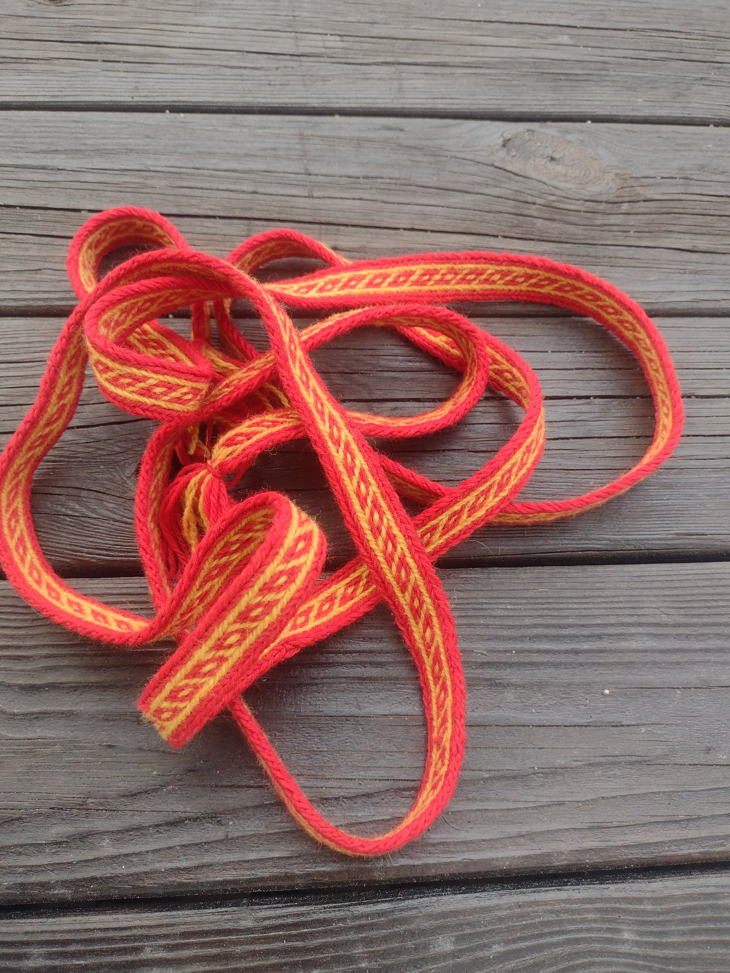 Red/yellow belt with Oseberg pattern from Viking age