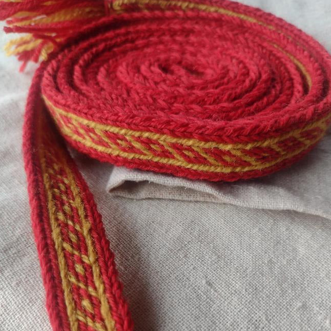 Red/yellow belt with Oseberg pattern from Viking age