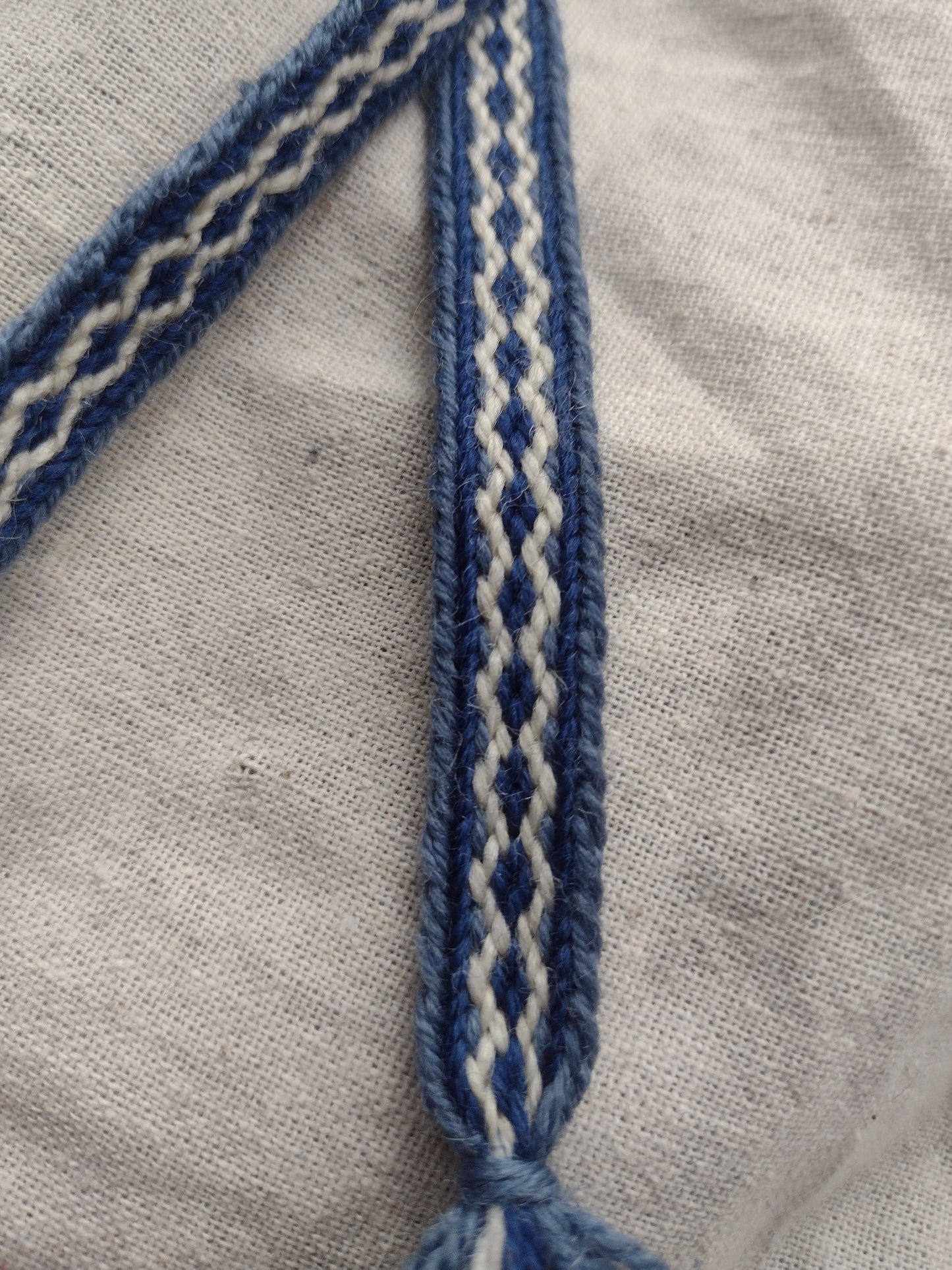 Narrow double sided Latvian style ribbon