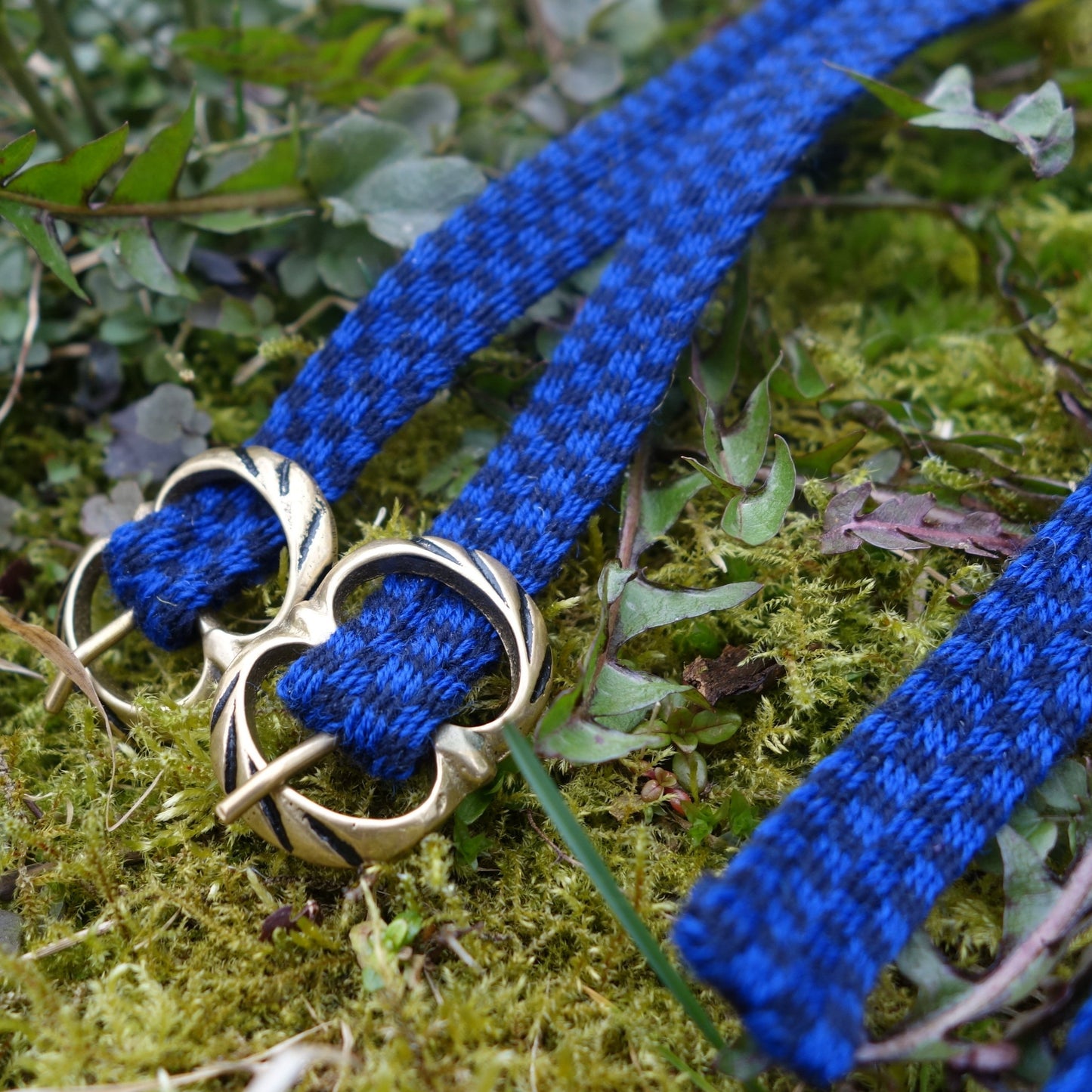 Pair of dark blue garters with checkboard pattern (14th-17th century)